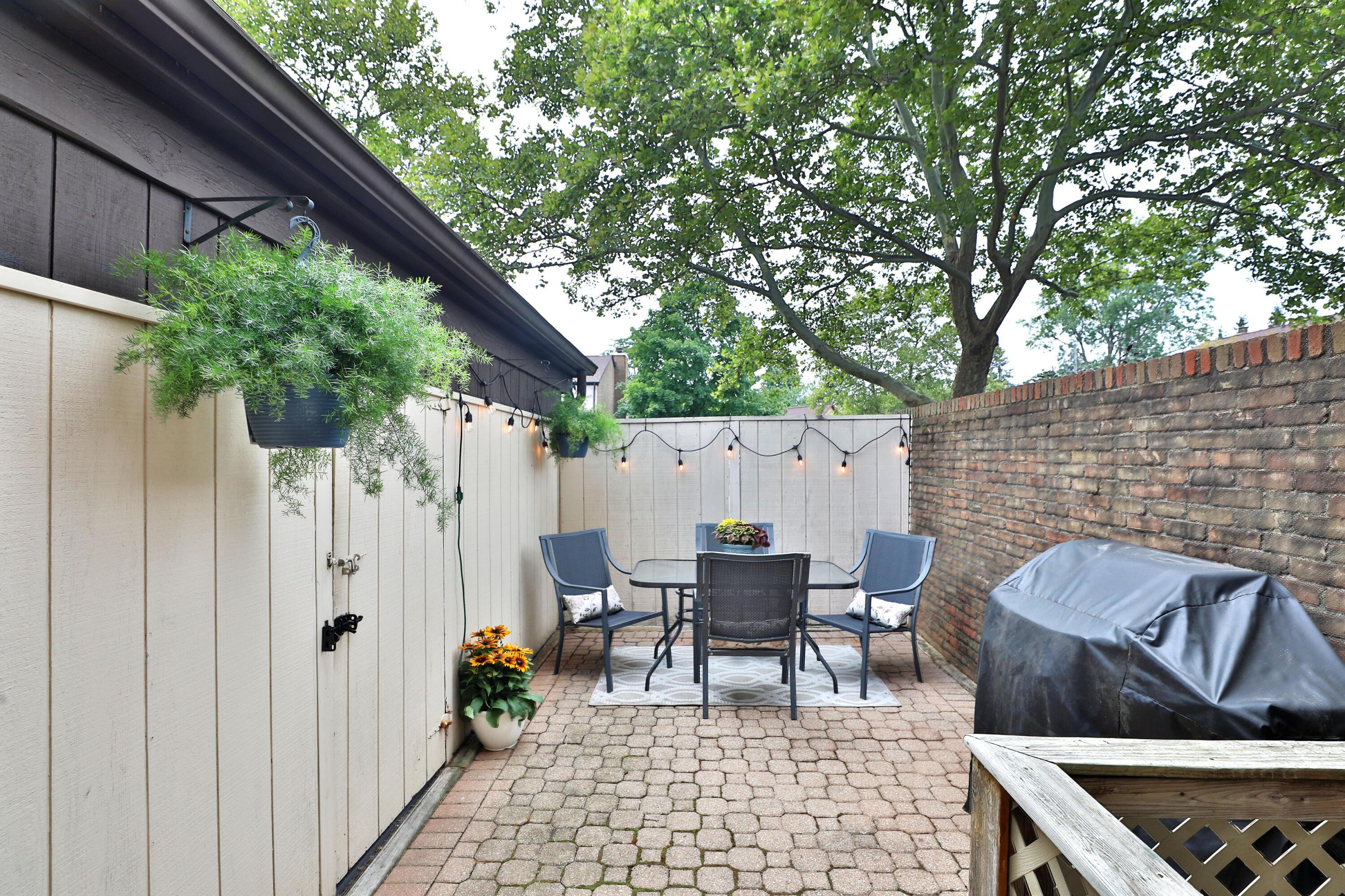 5365 Reed Road Columbus, OH 43235 - Photo 33 of 37 Private Paver Patio leading to the Carport