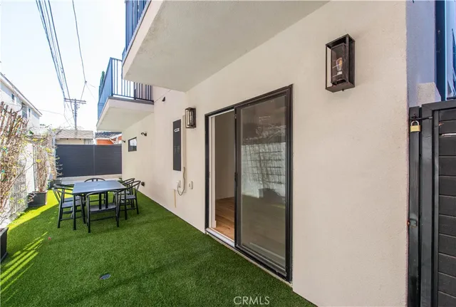 a view of backyard door and porch