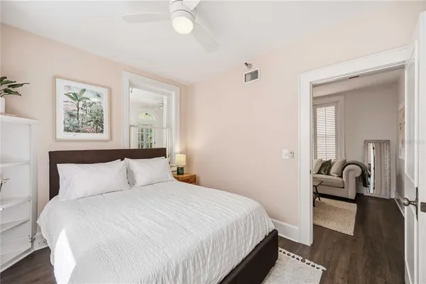 a bedroom with a bed and a view of bedroom