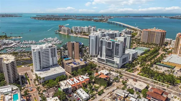 a view of a city with ocean view