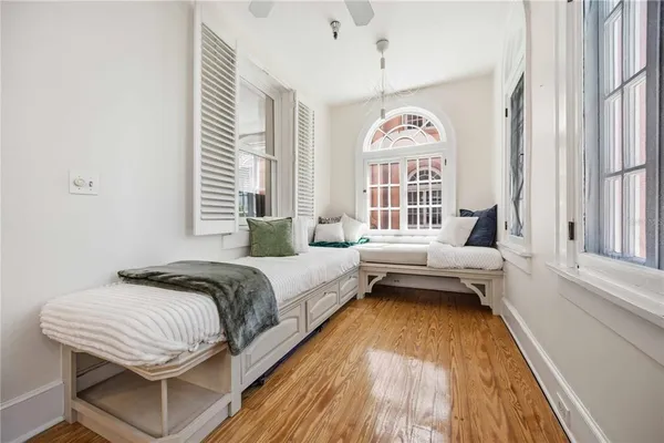 a spacious bedroom with a bed and window
