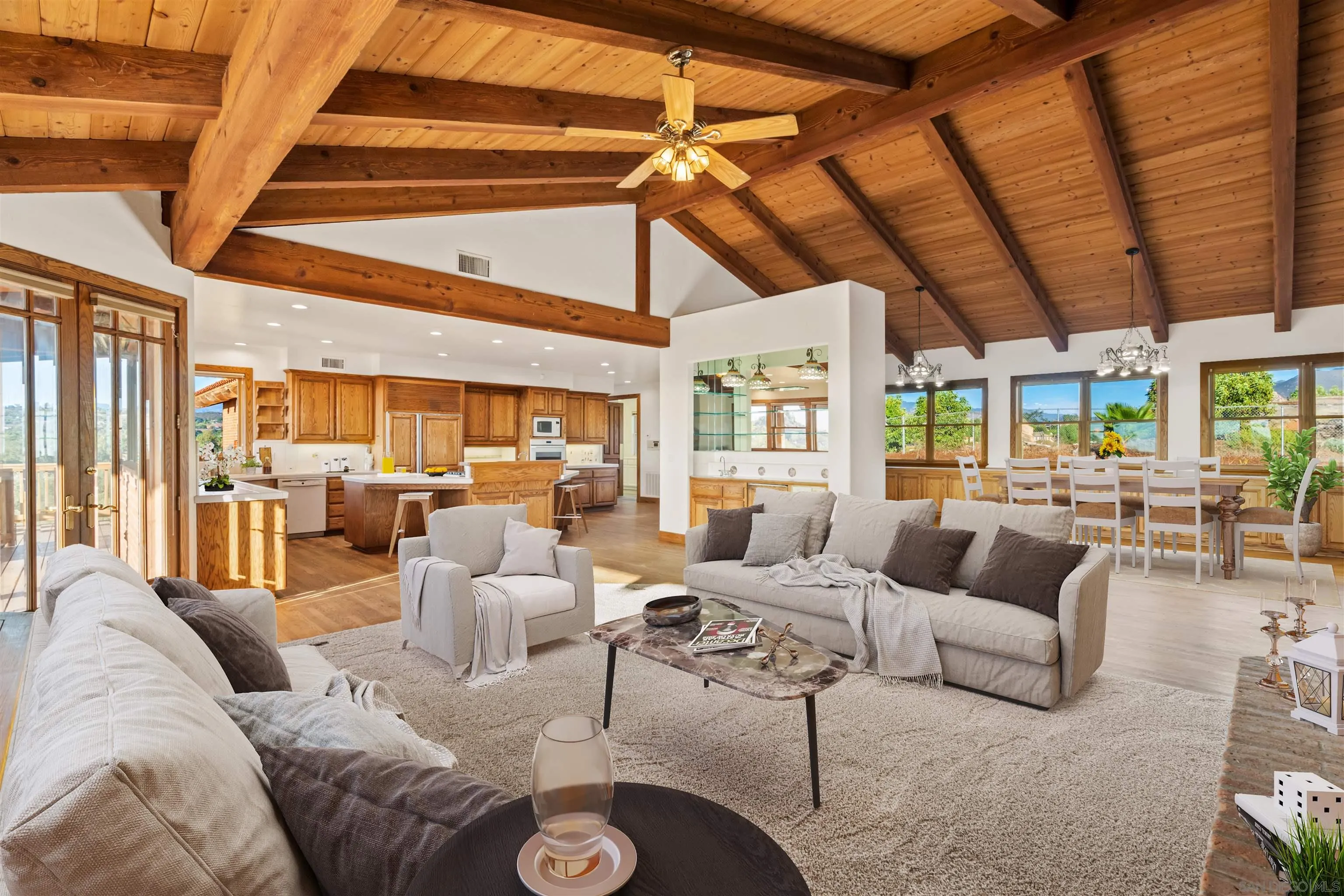 15718 Fruitvale Road Valley Center, CA 92082 - Photo 24 of 49 a living room with furniture and a large window