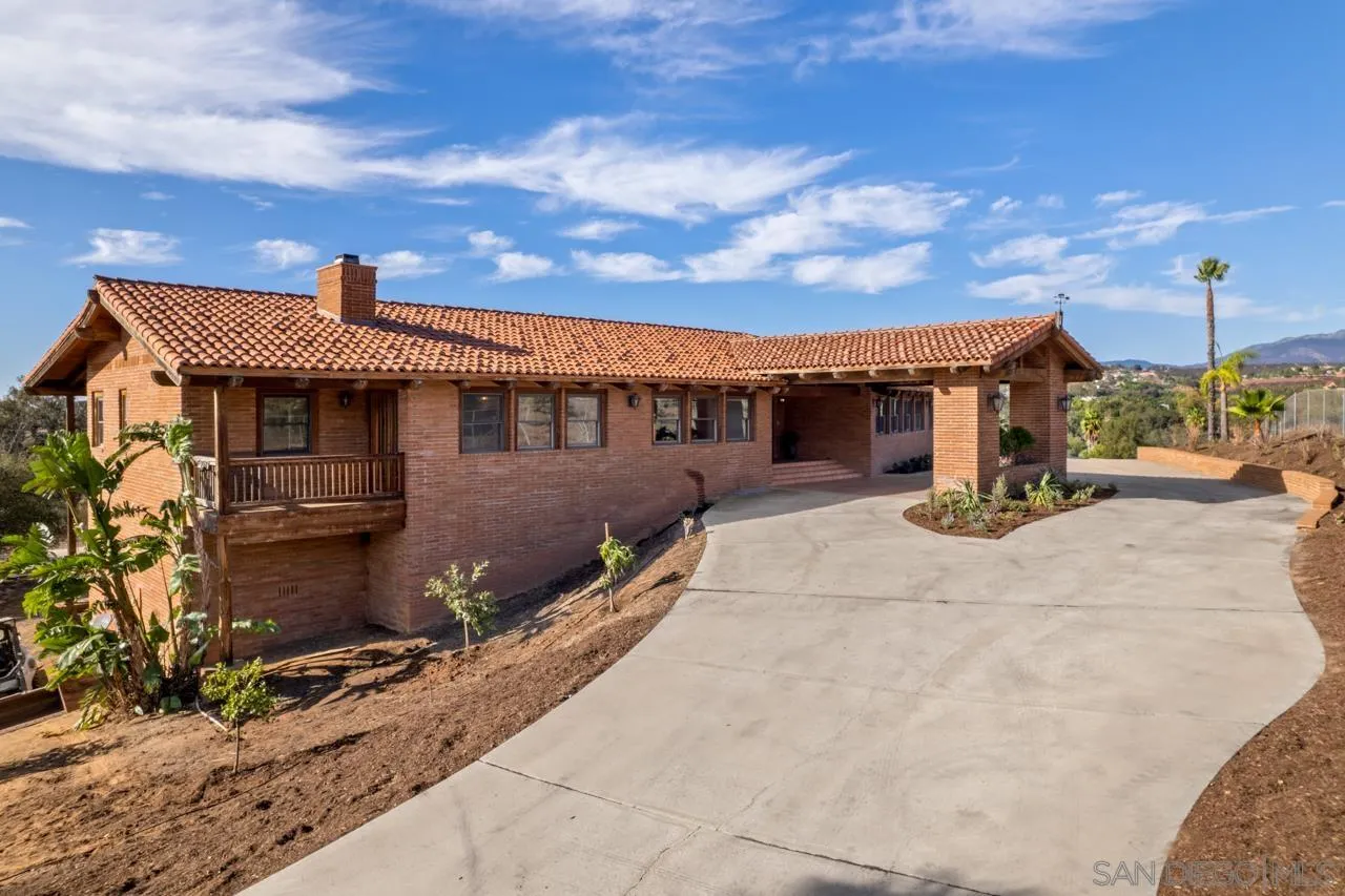 15718 Fruitvale Road Valley Center, CA 92082 - Photo 3 of 49 a view of a house with a patio