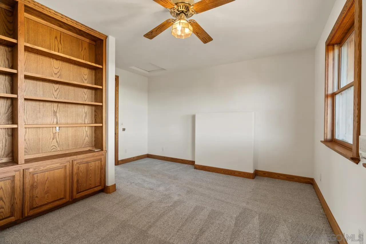 15718 Fruitvale Road Valley Center, CA 92082 - Photo 32 of 49 a view of an empty room with a window
