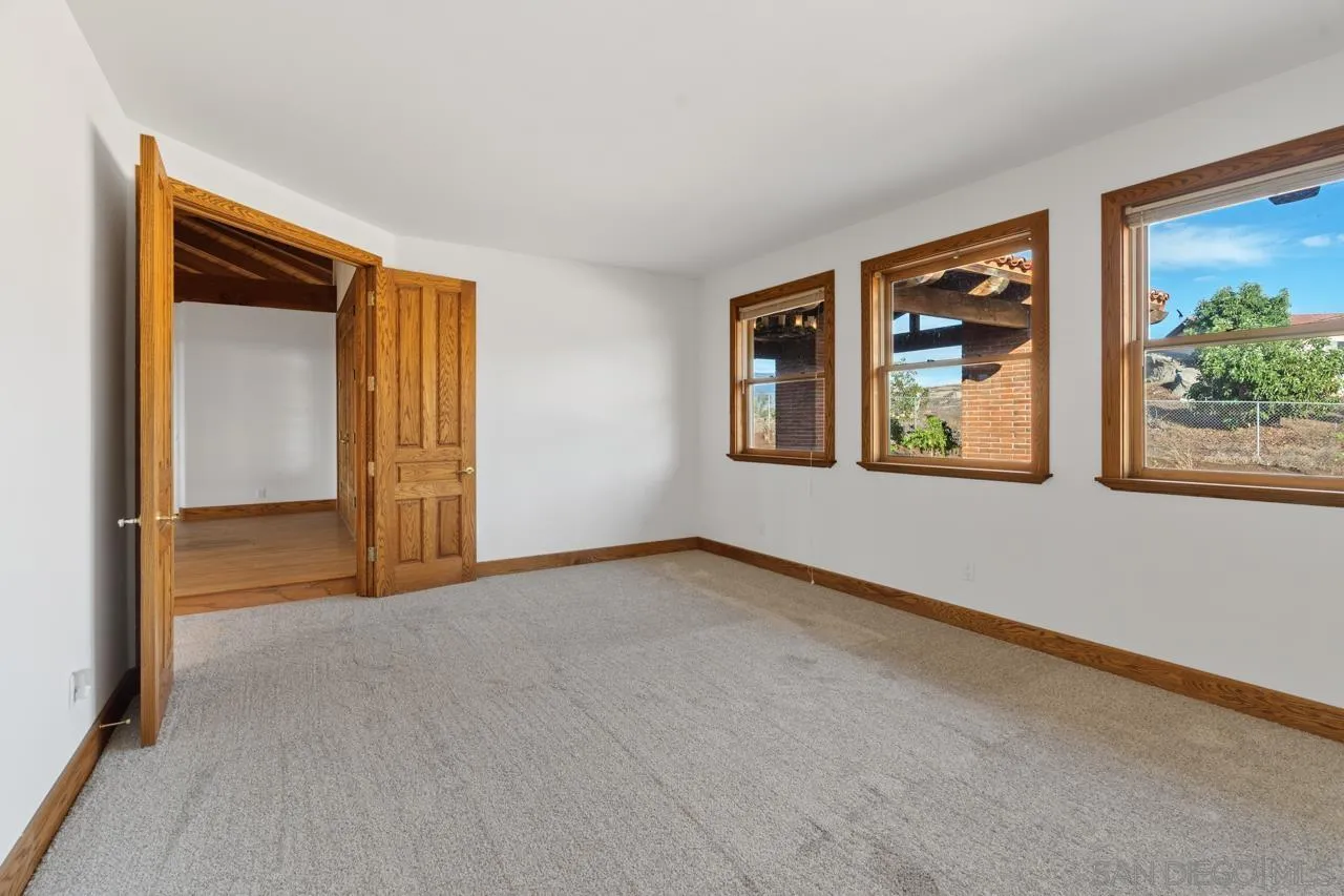 15718 Fruitvale Road Valley Center, CA 92082 - Photo 34 of 49 an empty room that has a window