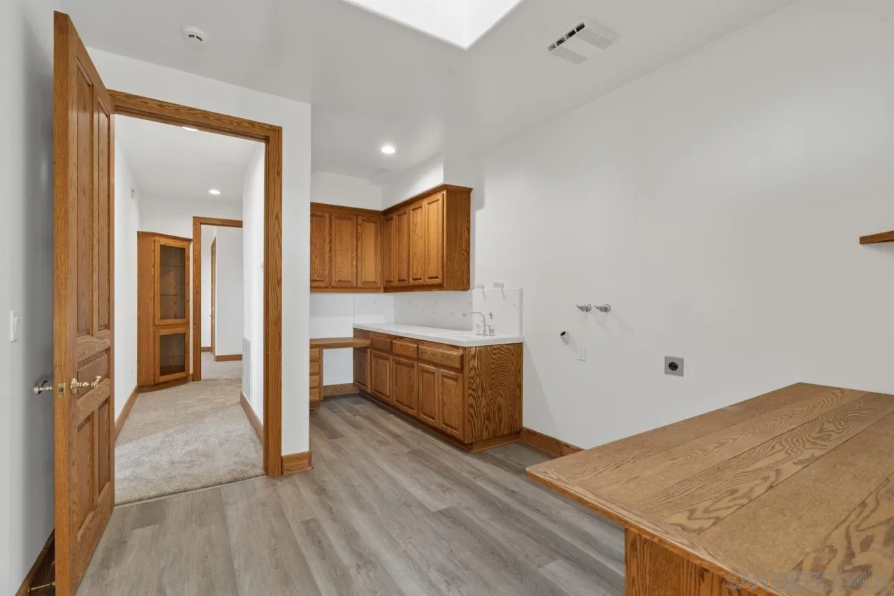 15718 Fruitvale Road Valley Center, CA 92082 - Photo 39 of 49 a view of kitchen and wooden floor