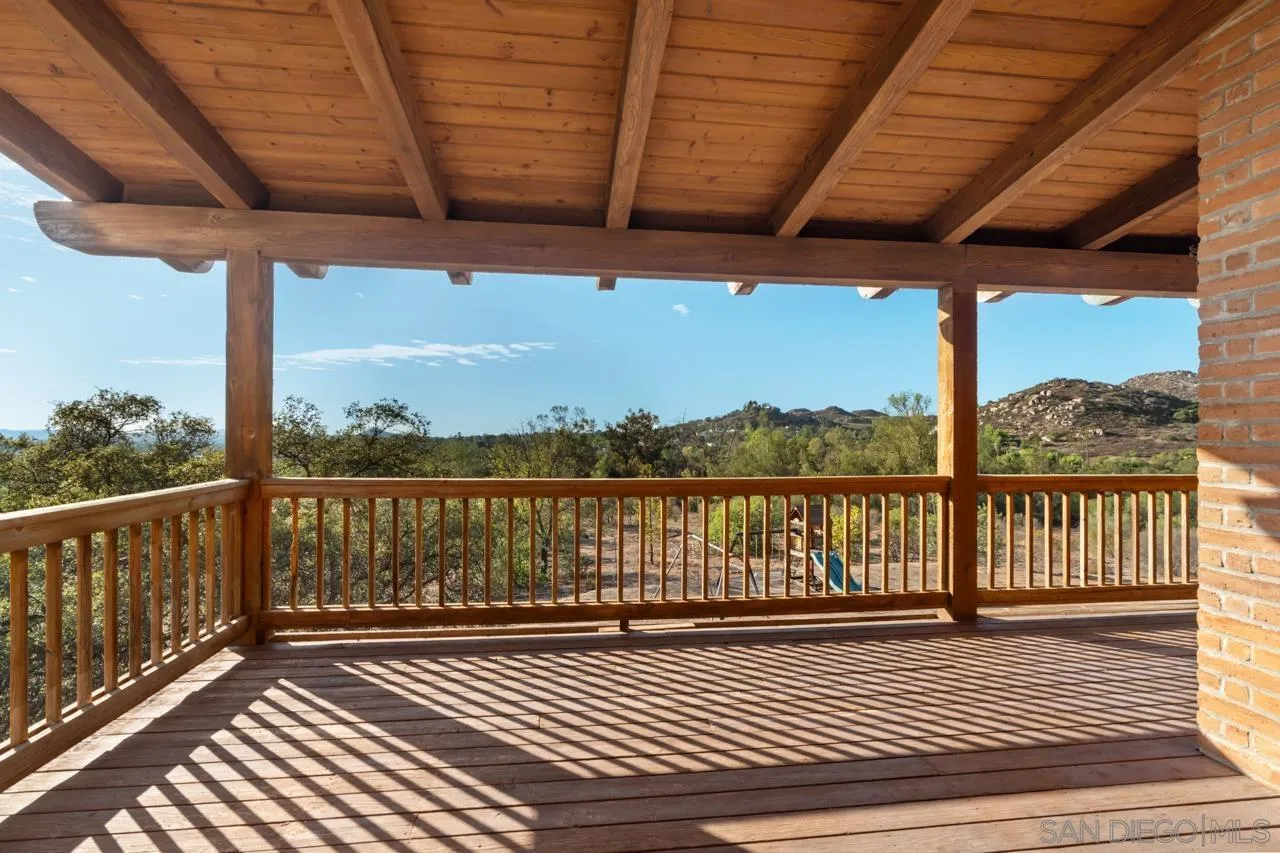 15718 Fruitvale Road Valley Center, CA 92082 - Photo 41 of 49 a view of balcony with wooden floor