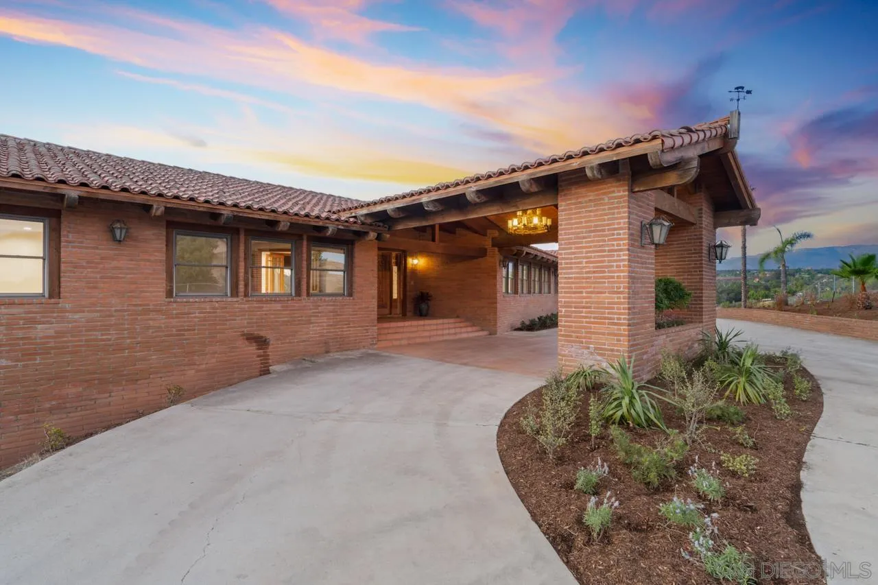 15718 Fruitvale Road Valley Center, CA 92082 - Photo 47 of 49 a front view of a house with garden