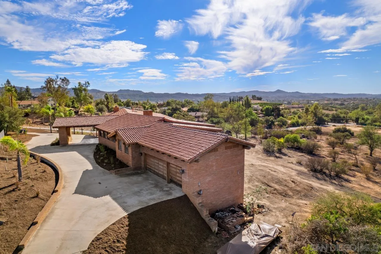 15718 Fruitvale Road Valley Center, CA 92082 - Photo 7 of 49 a view of a terrace with a garden