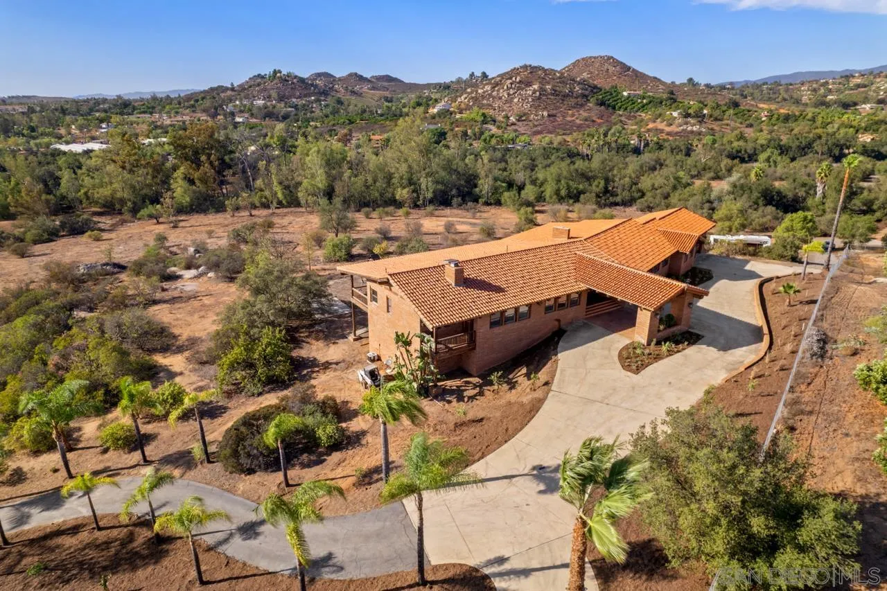 15718 Fruitvale Road Valley Center, CA 92082 - Photo 9 of 49 an aerial view of a house with mountain view