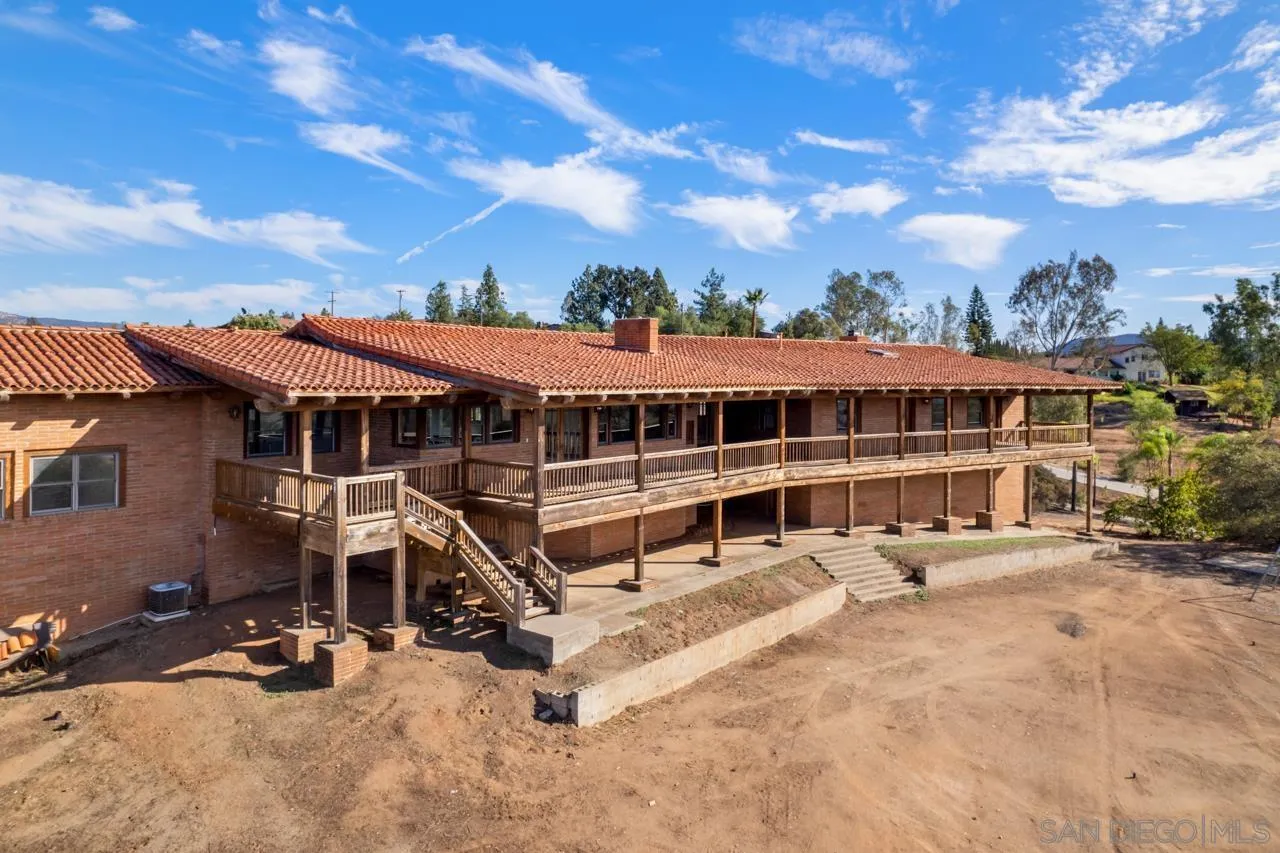 15718 Fruitvale Road Valley Center, CA 92082 - Photo 10 of 49 a view of a house with a patio
