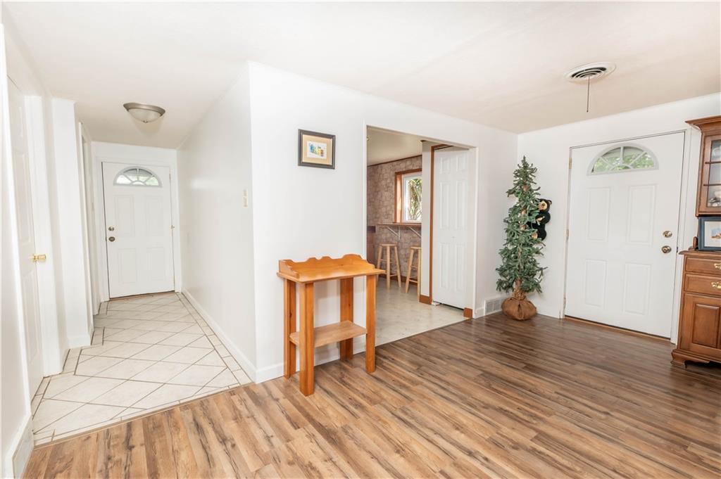 64 North Ridge Road Shelocta, PA 15774 - Photo 11 of 25 a view of a livingroom with wooden floor and a hallway