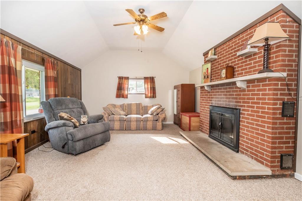 64 North Ridge Road Shelocta, PA 15774 - Photo 17 of 25 a living room with furniture a fireplace and a large window