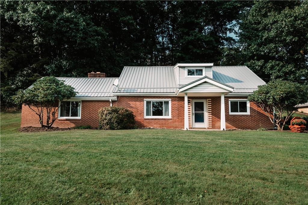 64 North Ridge Road Shelocta, PA 15774 - Photo 2 of 25 a front view of a house with a yard