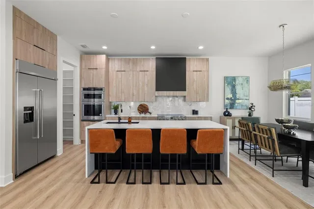 a view of a dining room with furniture