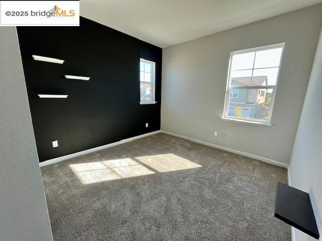 761 Stickney Way Oakley, CA 94561 - Photo 10 of 18 Empty room with carpet flooring and baseboards