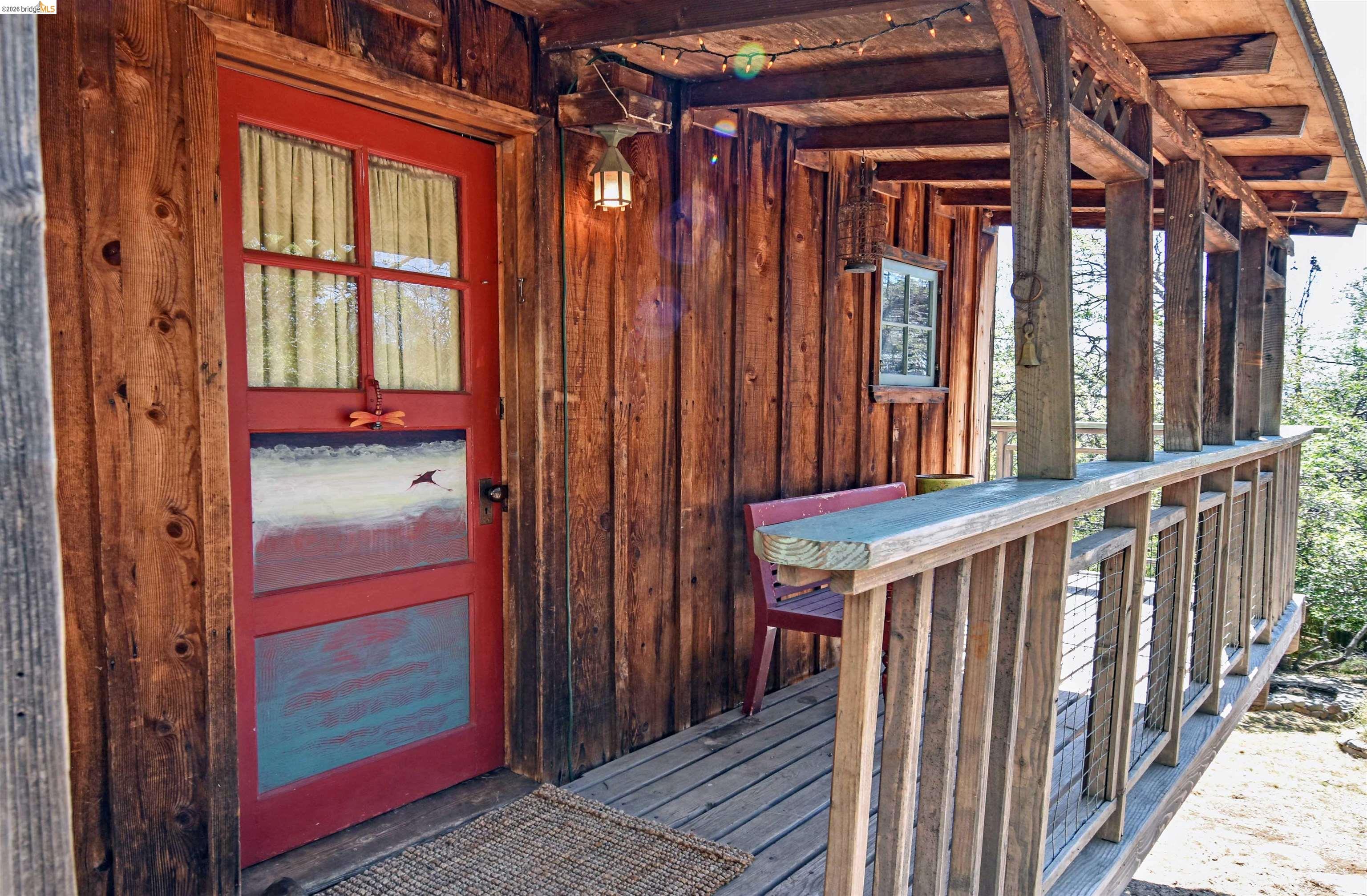 17270 Robin Ridge Road Sonora, CA 95370 - Photo 12 of 60 Property entrance with a wooden deck