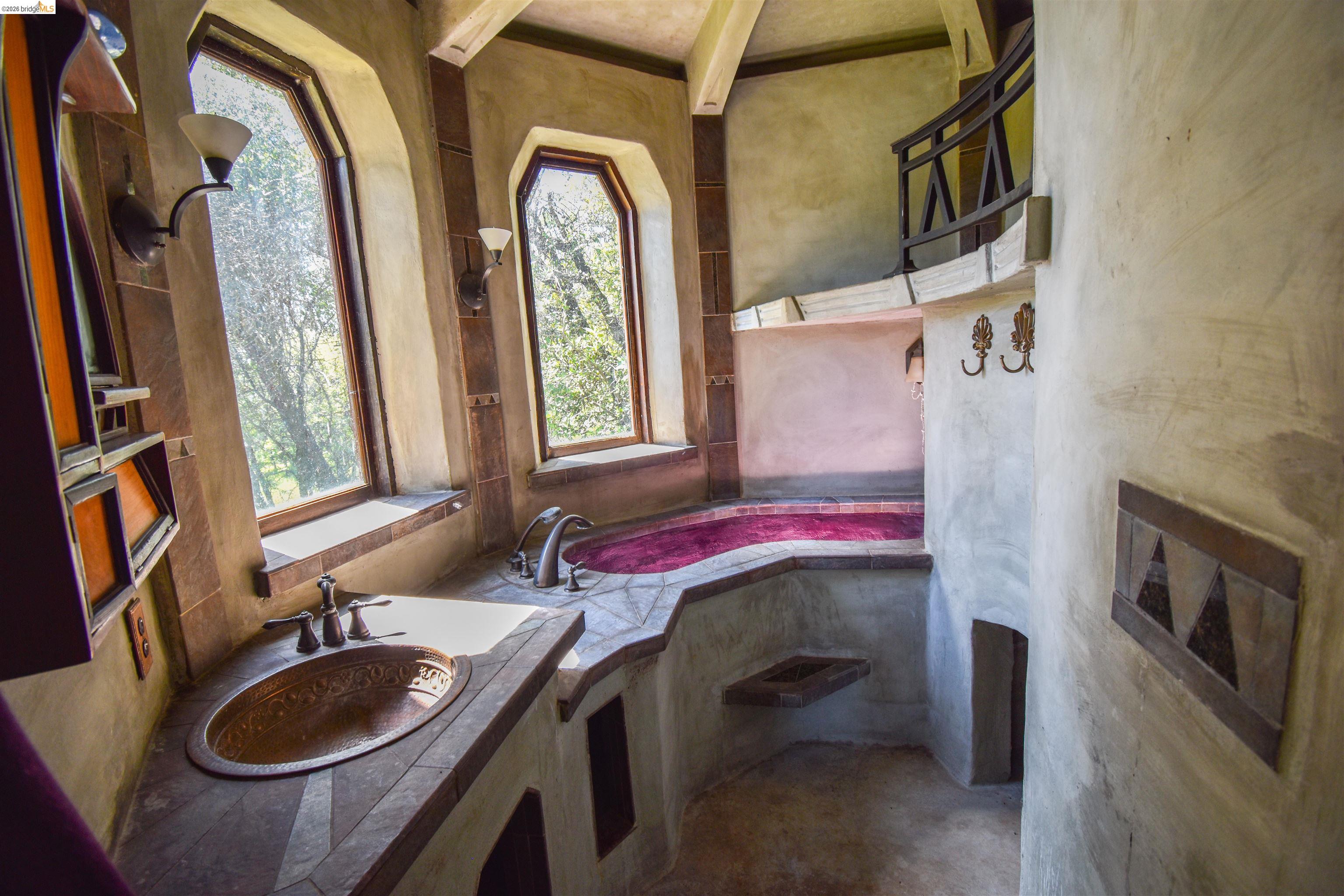 17270 Robin Ridge Road Sonora, CA 95370 - Photo 35 of 60 Full bathroom featuring a bath and concrete floors