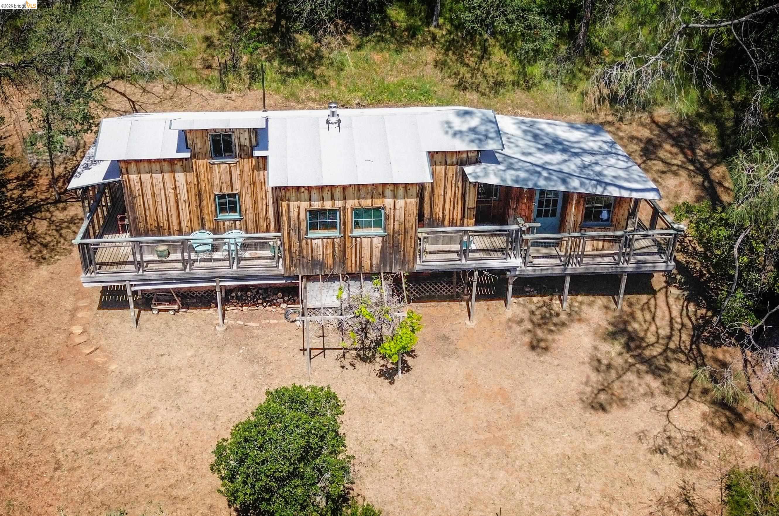 17270 Robin Ridge Road Sonora, CA 95370 - Photo 7 of 60 Rear view of property with a deck