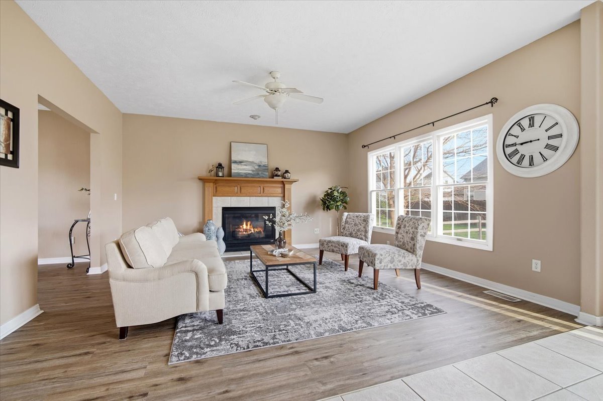 3255 Fire Fly Court Normal, IL 61761 - Photo 5 of 25 a living room with furniture and a fireplace