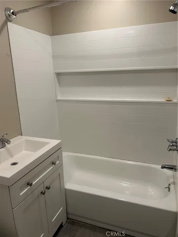 a bathroom with a sink and a bathtub