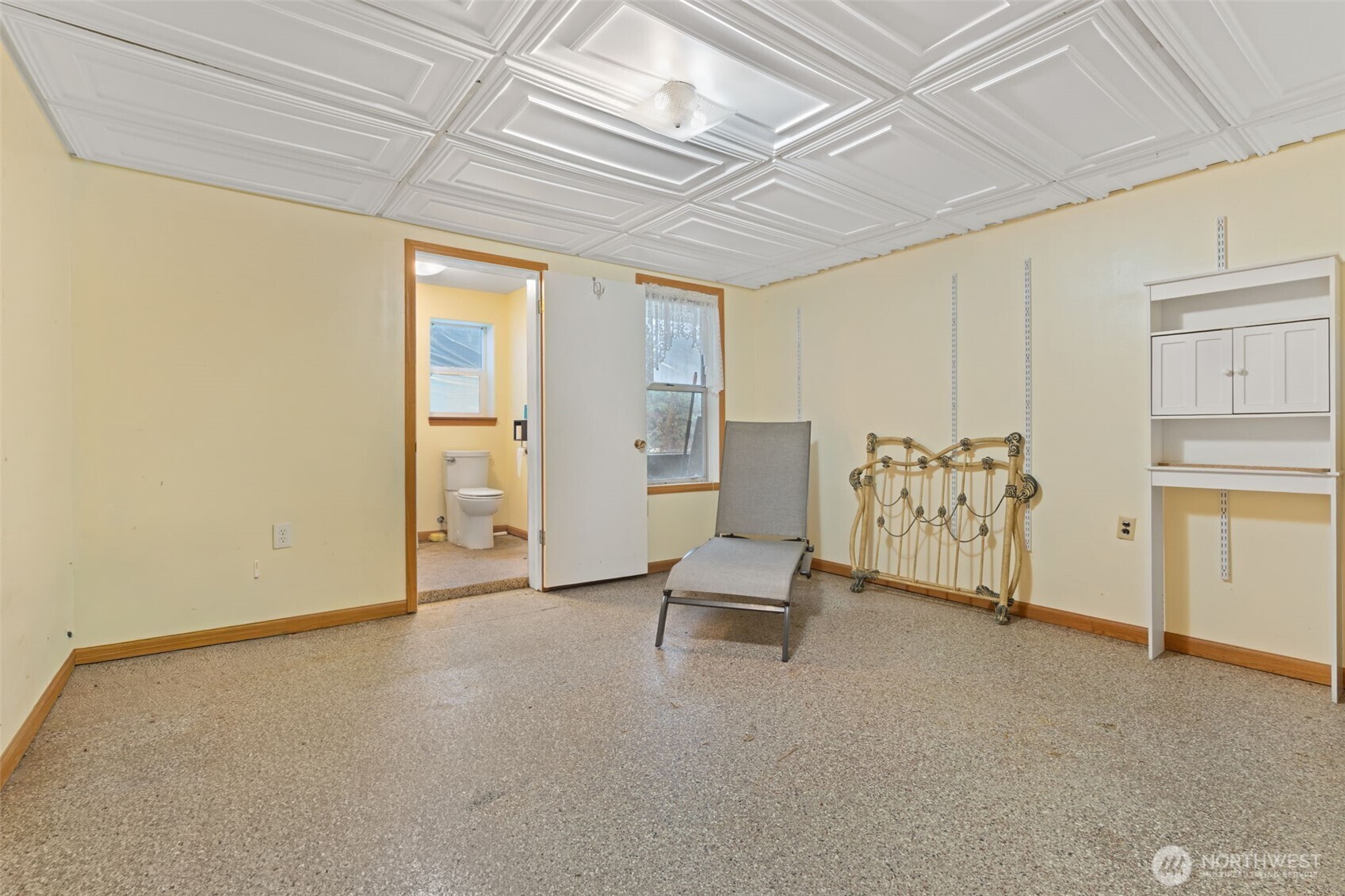 451 Elk Creek Road Chehalis, WA 98532 - Photo 17 of 31 an empty room with a bench and painted walls