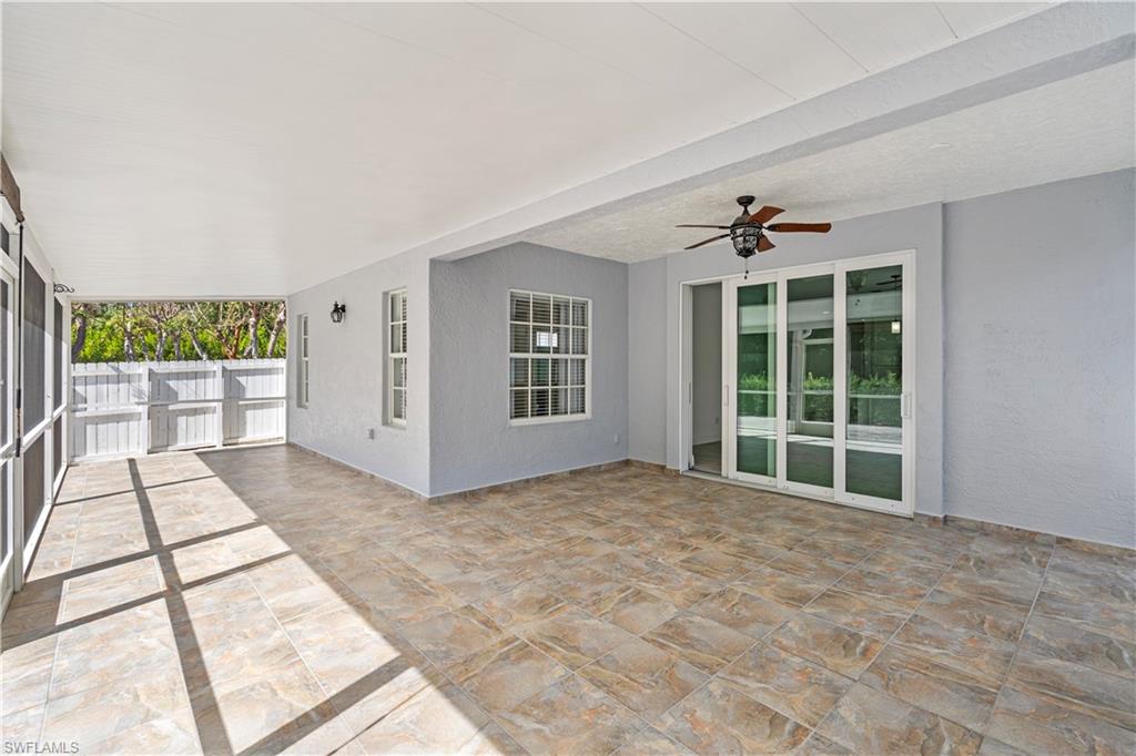 183 7th Street Naples, FL 34113 - Photo 34 of 50 Large covered terrace with plenty of room for entertainment