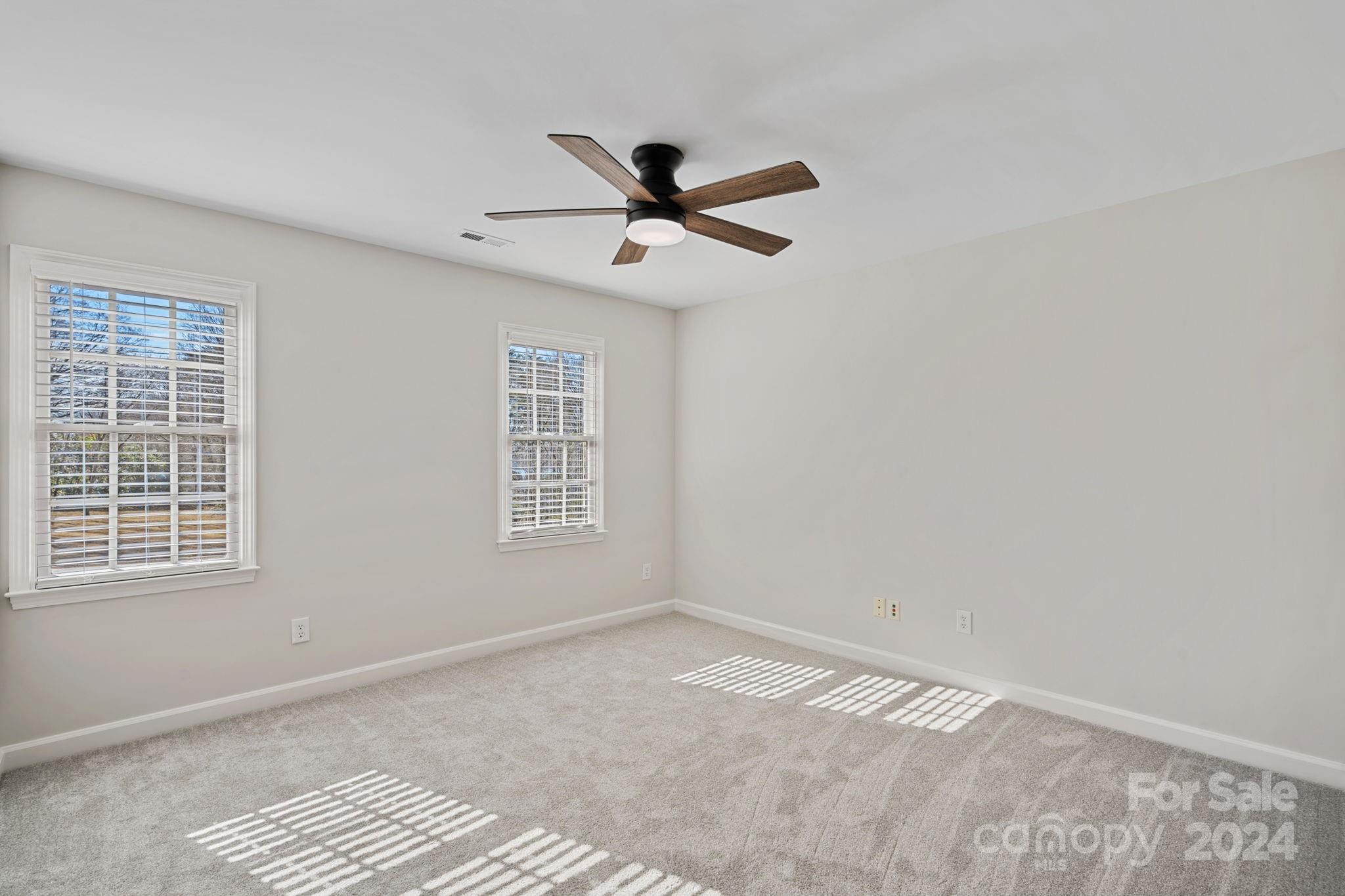 21140 Bethel Church Road Cornelius, NC 28031 - Photo 25 of 48 a view of an empty room with a window