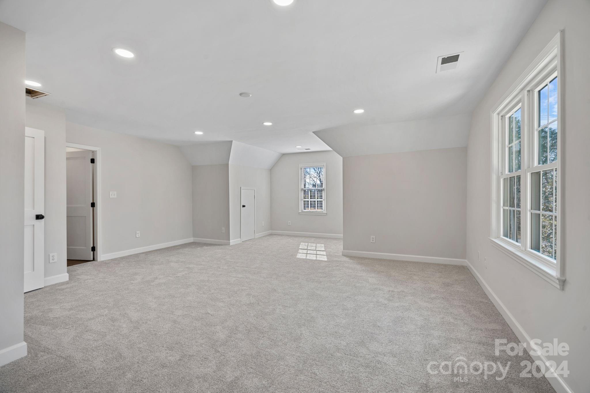 21140 Bethel Church Road Cornelius, NC 28031 - Photo 32 of 48 a view of an empty room with a window