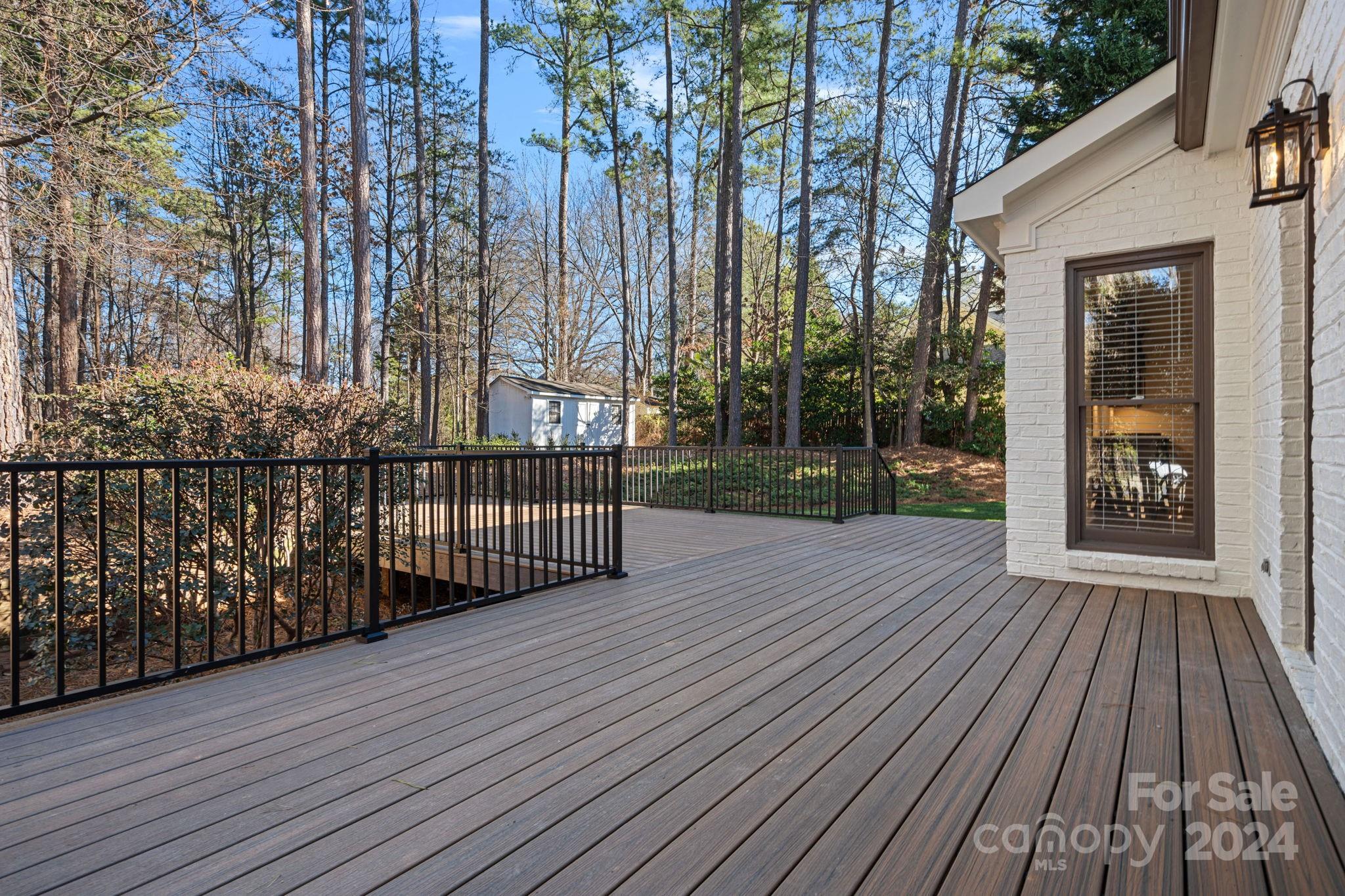 21140 Bethel Church Road Cornelius, NC 28031 - Photo 34 of 48 a view of a wooden deck
