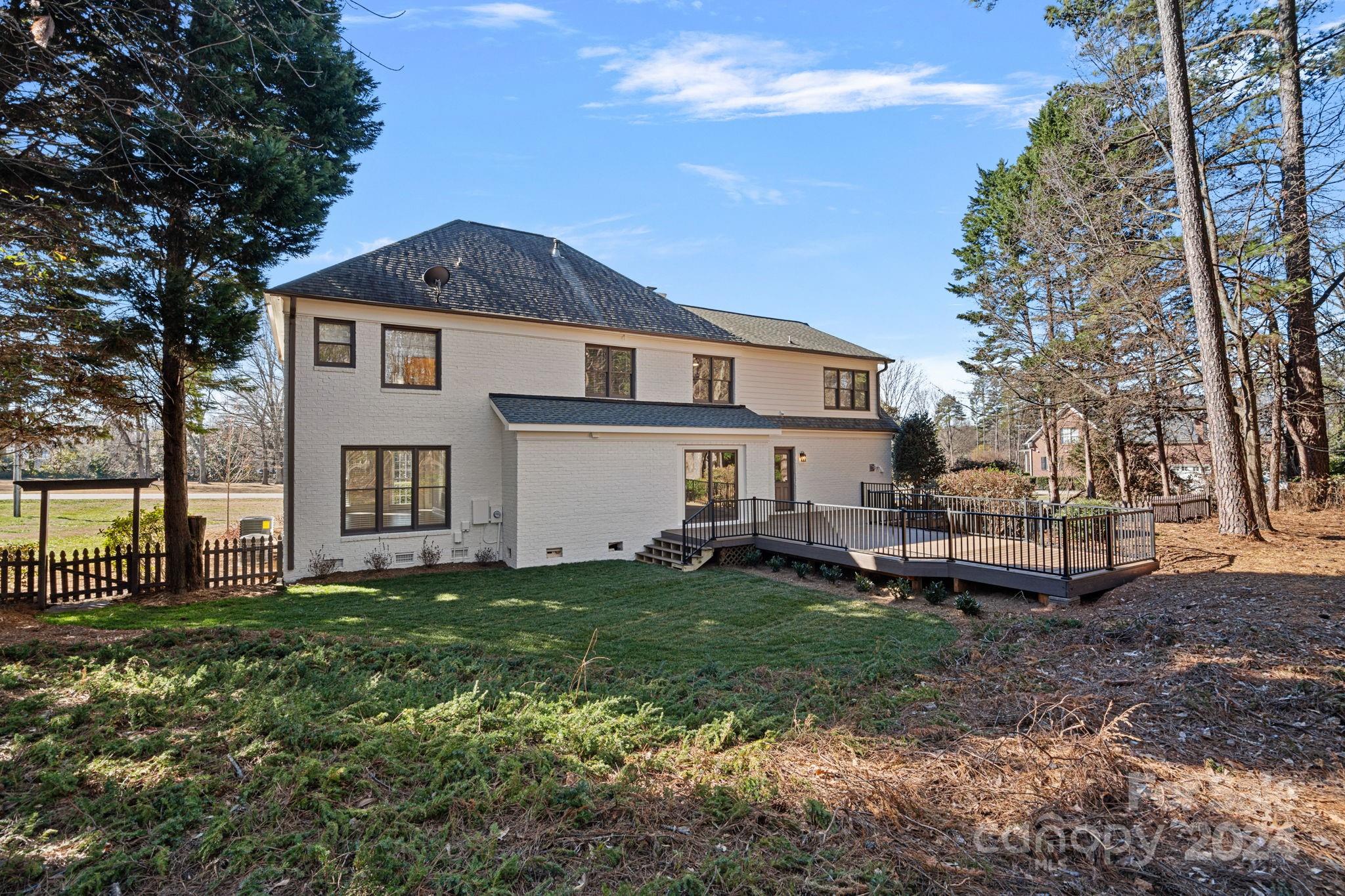 21140 Bethel Church Road Cornelius, NC 28031 - Photo 39 of 48 a front view of a house with a yard
