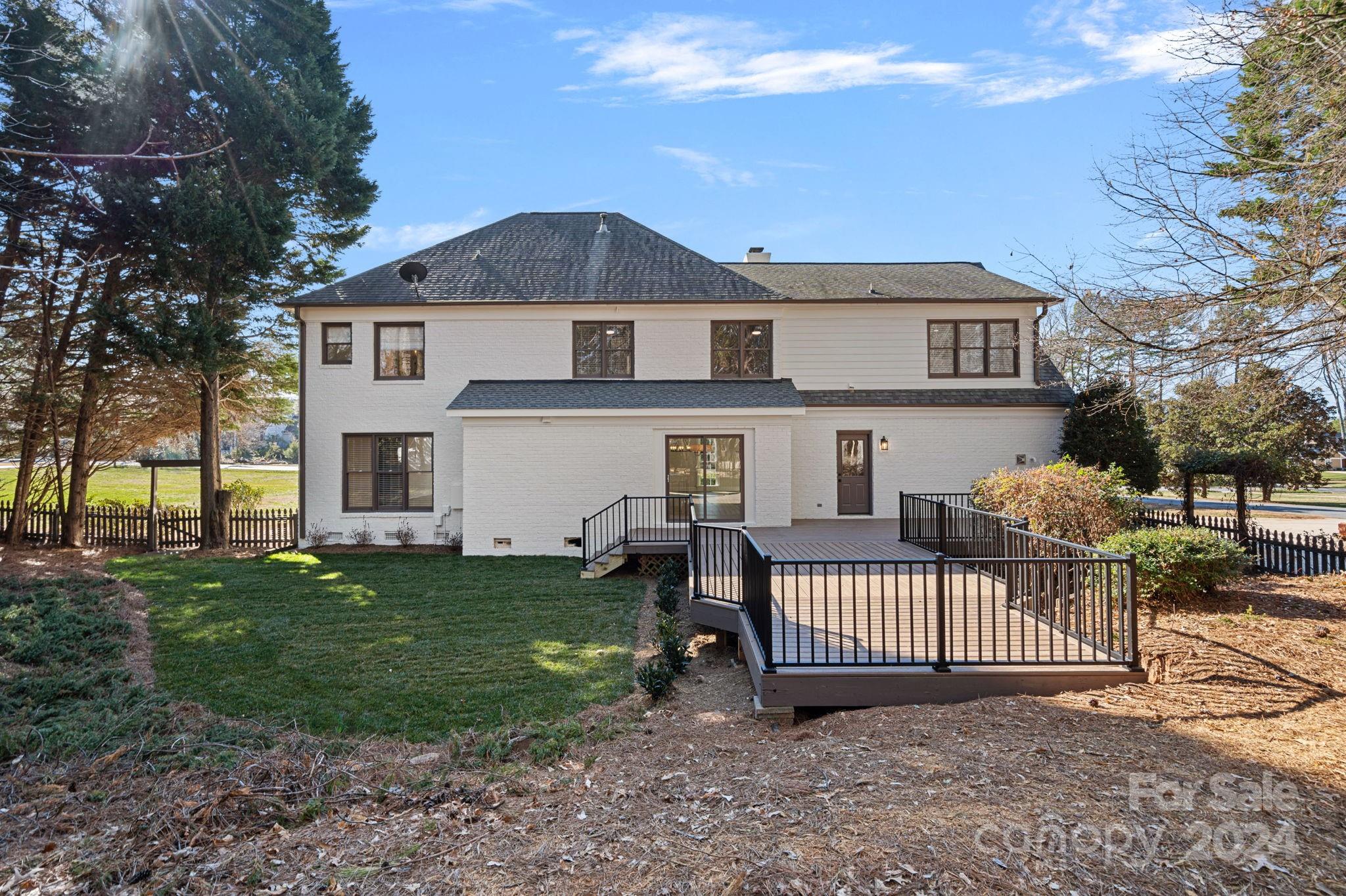 21140 Bethel Church Road Cornelius, NC 28031 - Photo 40 of 48 a view of a house with a yard and a porch