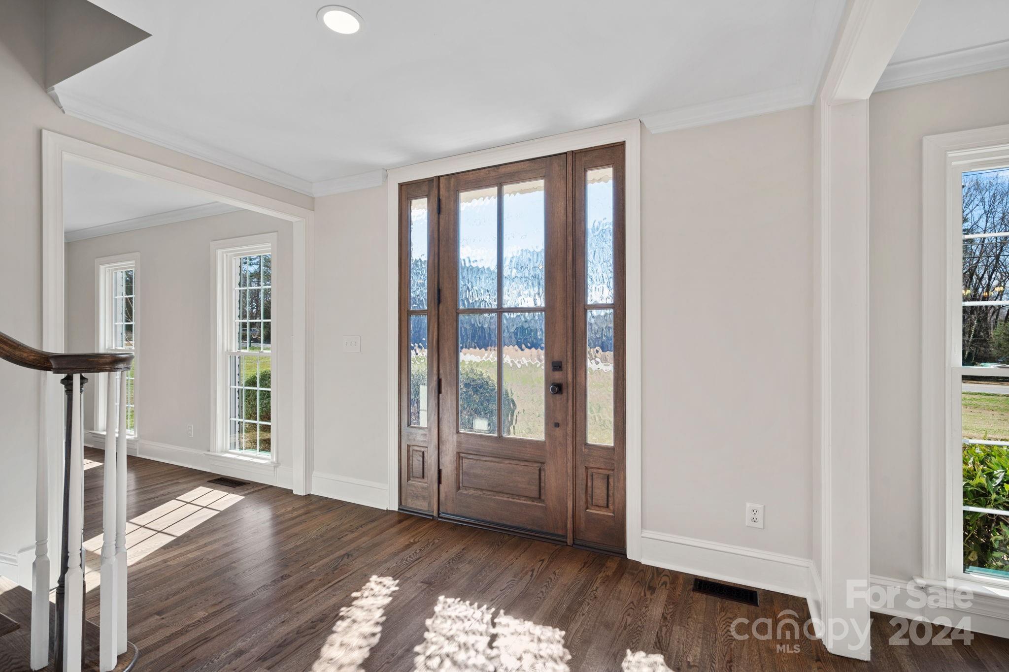 21140 Bethel Church Road Cornelius, NC 28031 - Photo 4 of 48 a view of livingroom with furniture wooden floor and window
