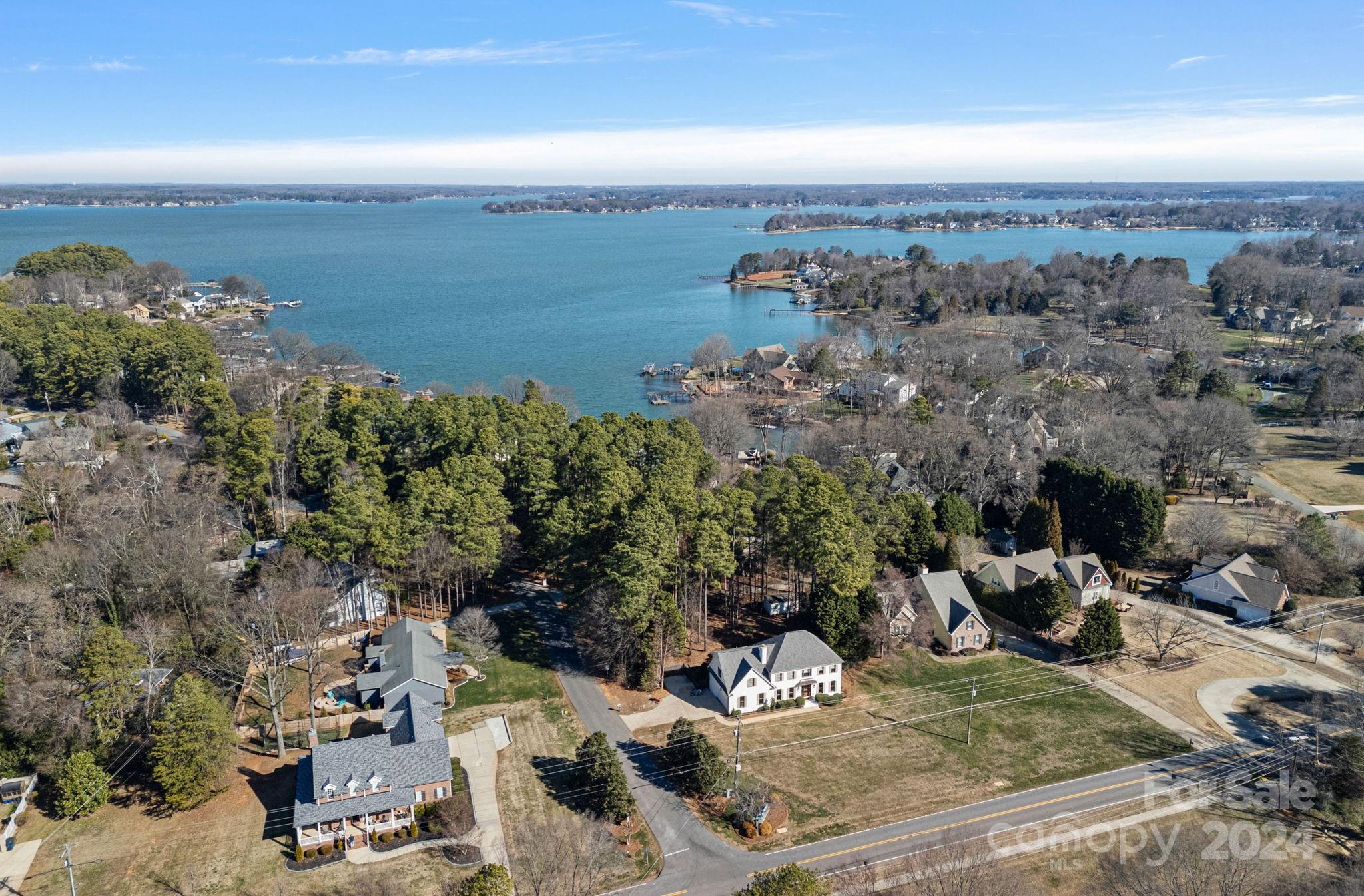 21140 Bethel Church Road Cornelius, NC 28031 - Photo 44 of 48 a view of a terrace with chairs and a table