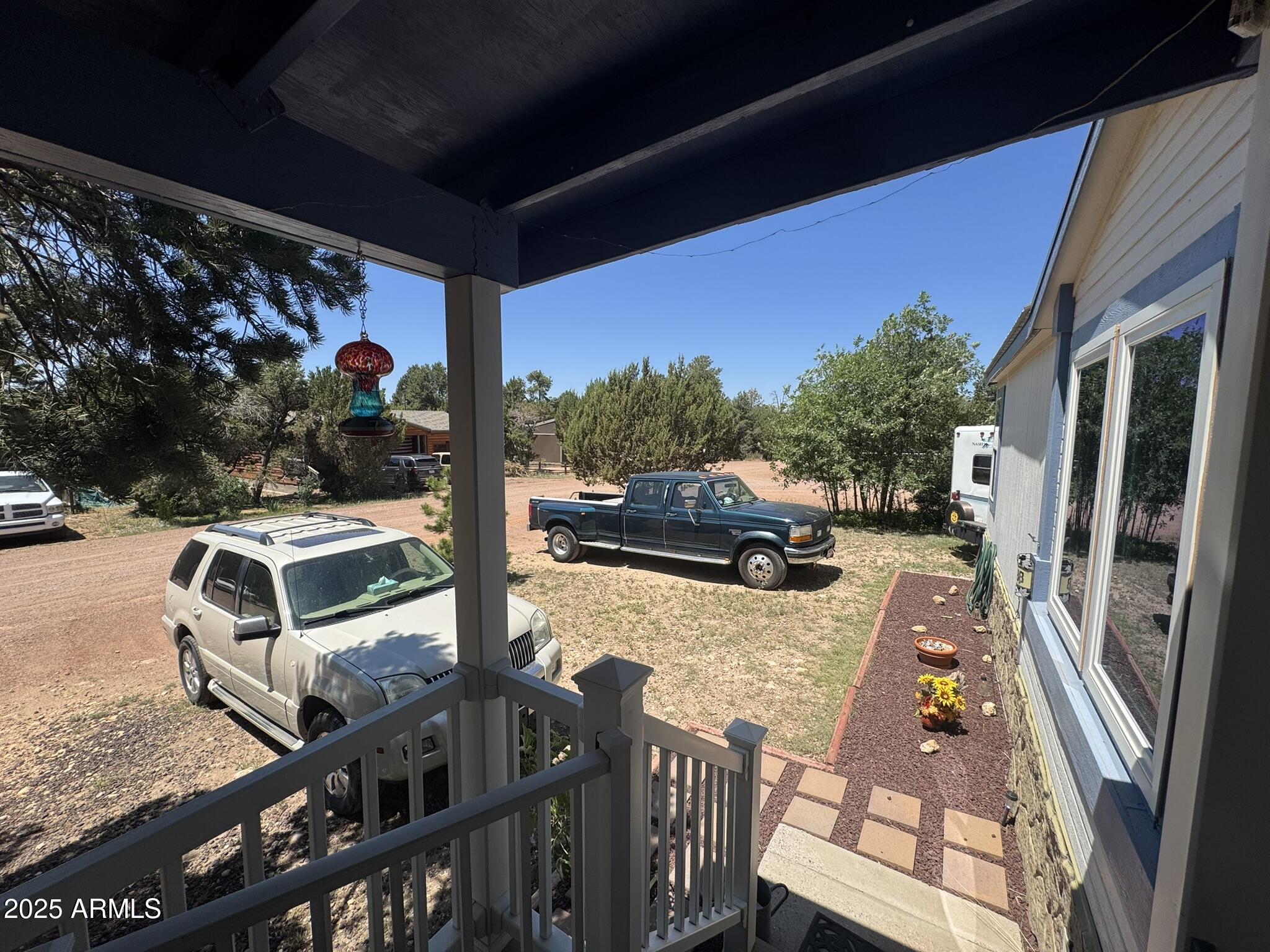 1998 Stagg Run Overgaard, AZ 85933 - Photo 17 of 61 a view of a porch with furniture
