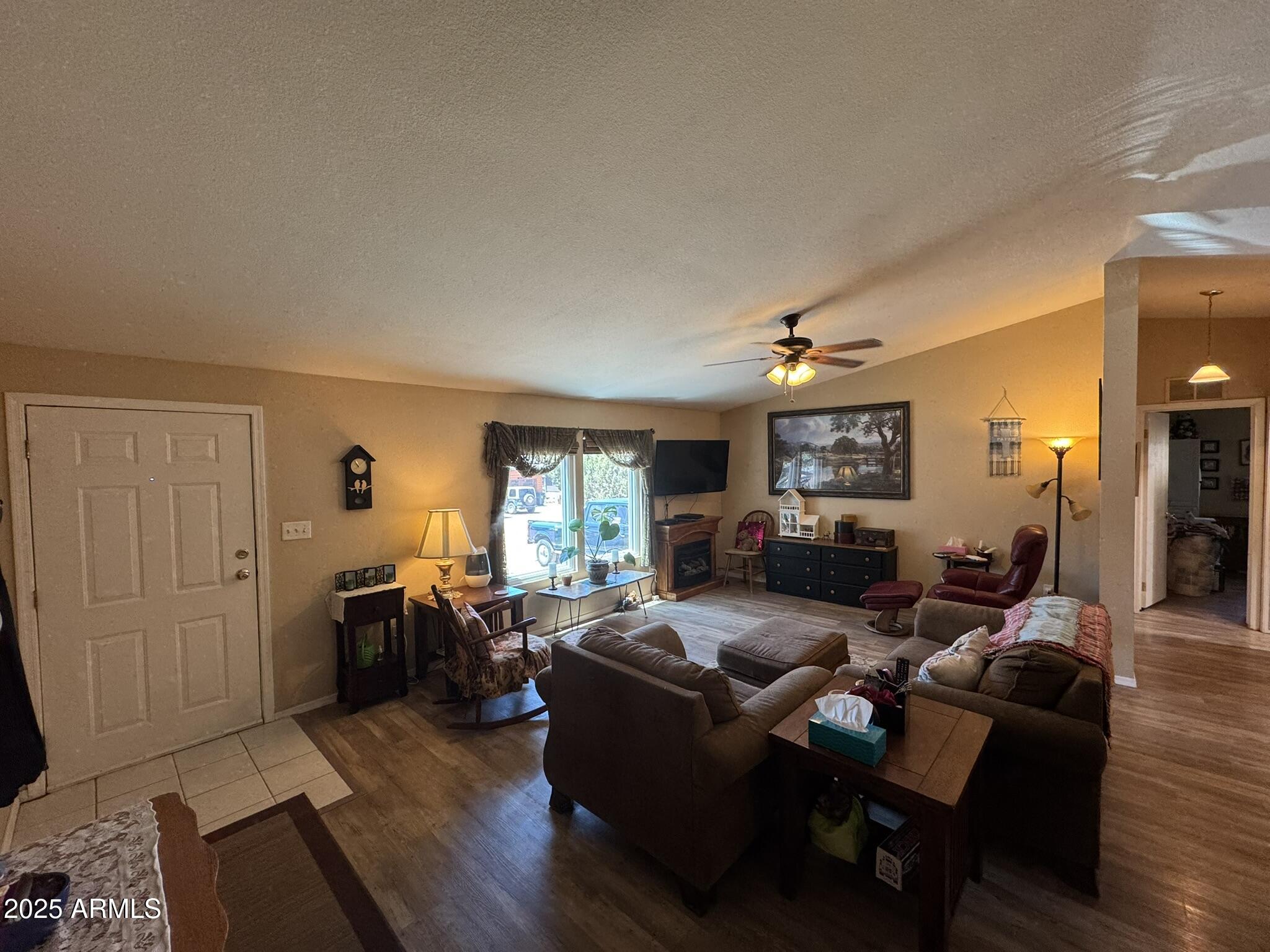 1998 Stagg Run Overgaard, AZ 85933 - Photo 19 of 61 a living room with furniture and a window