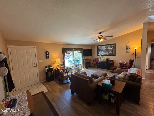 a spacious bedroom with a bed and furniture