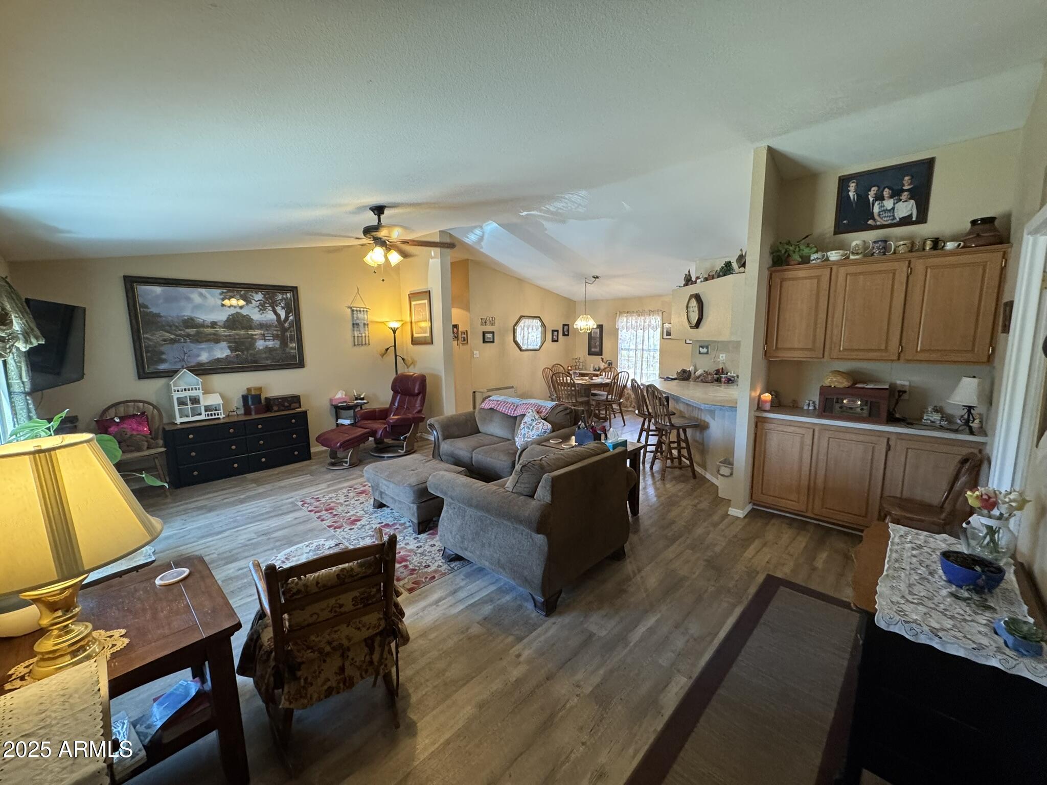 1998 Stagg Run Overgaard, AZ 85933 - Photo 21 of 61 a living room with furniture and a flat screen tv