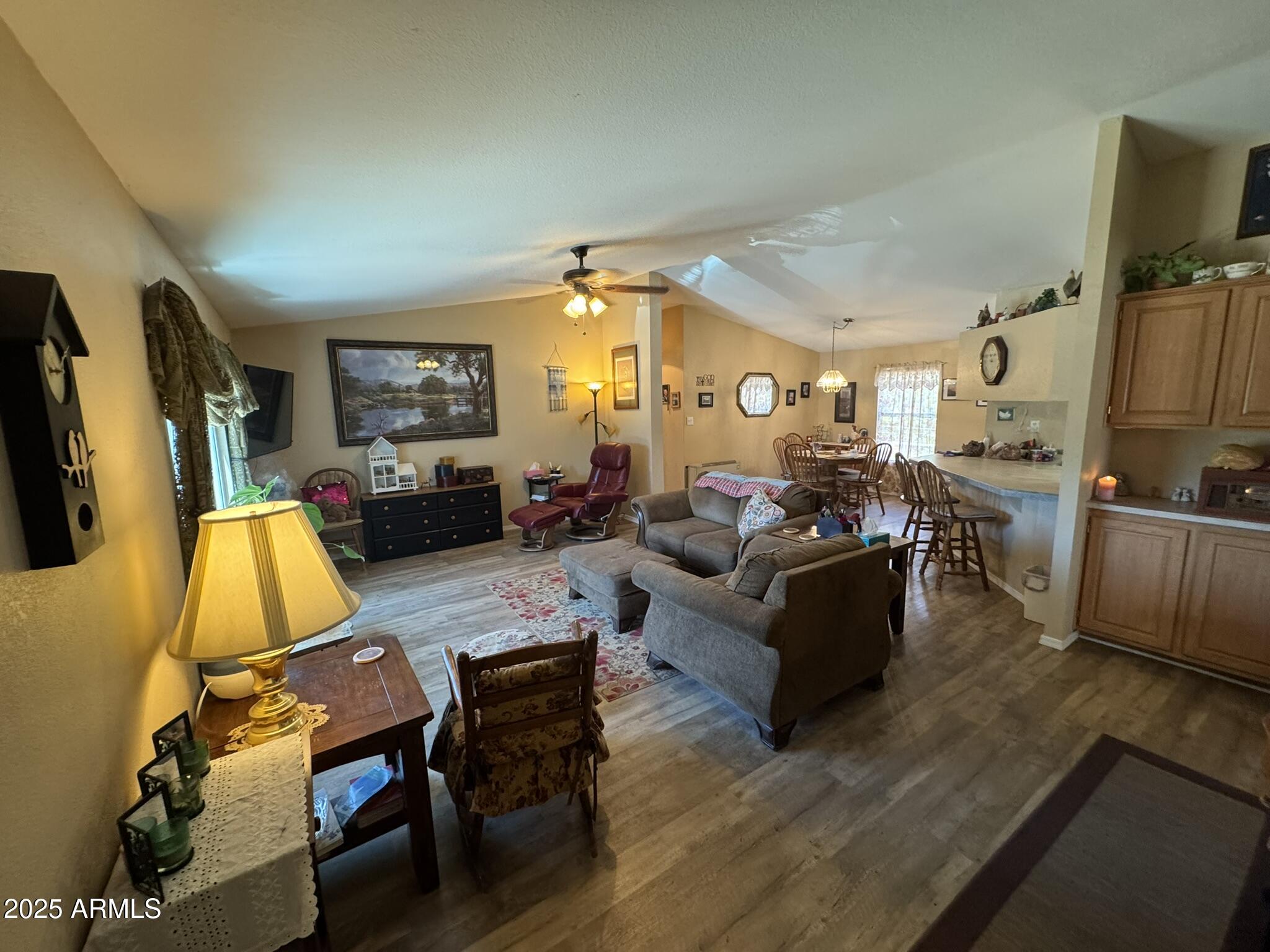 1998 Stagg Run Overgaard, AZ 85933 - Photo 22 of 61 a living room with furniture and a flat screen tv