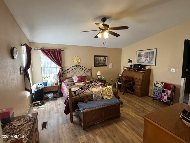 a room with a bed and a window