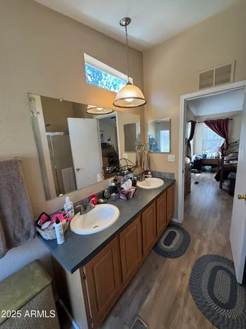 a bathroom with a sink toilet and bathtub