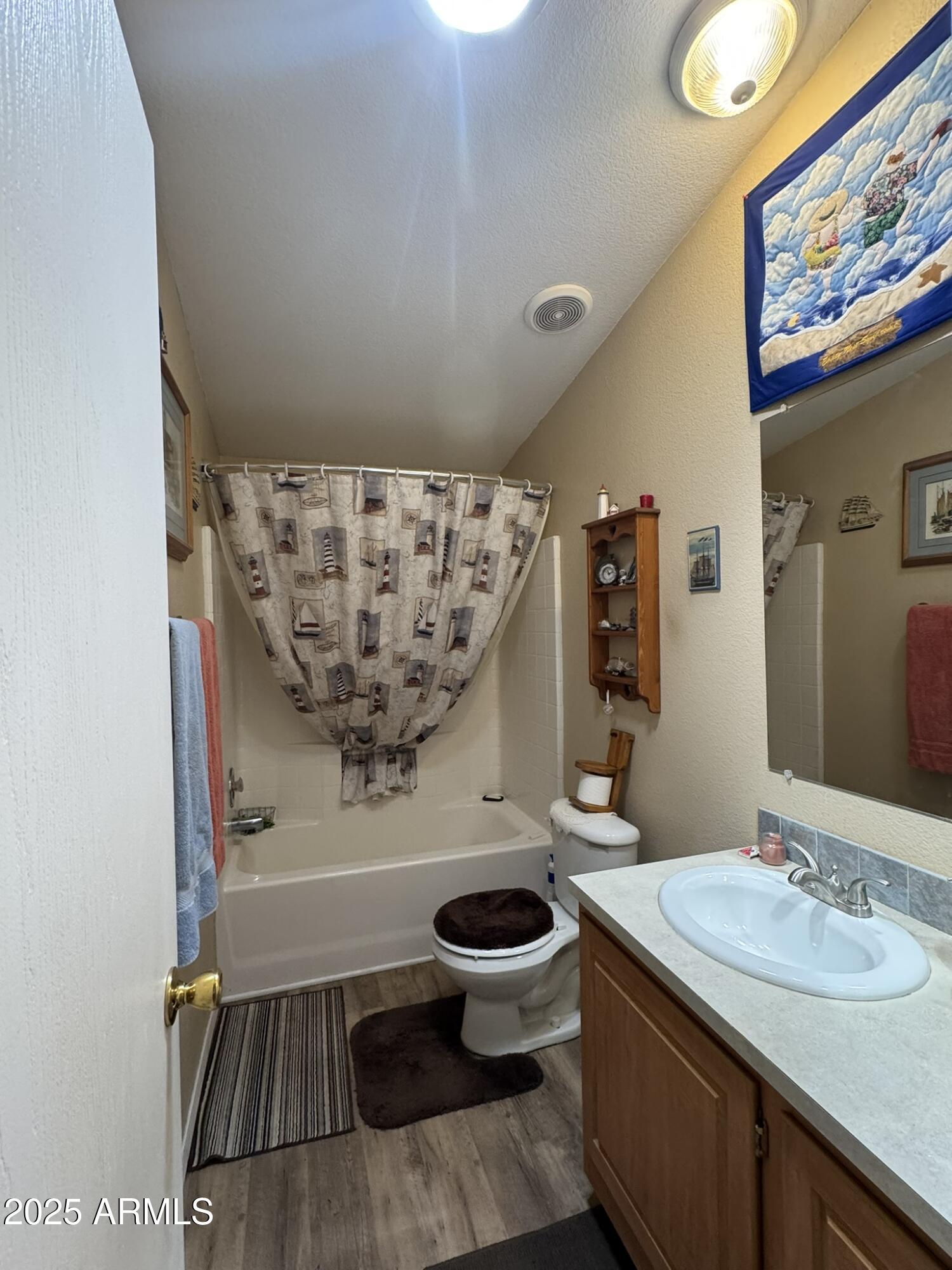 1998 Stagg Run Overgaard, AZ 85933 - Photo 40 of 61 a bathroom with a sink toilet and shower