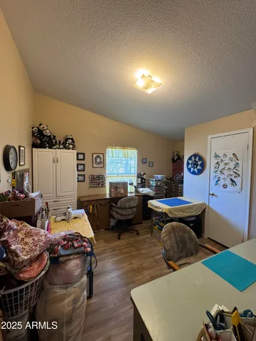 a kitchen with refrigerator and window