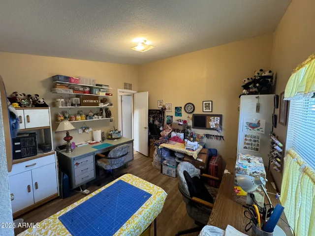 a kitchen with a stove a sink and a refrigerator