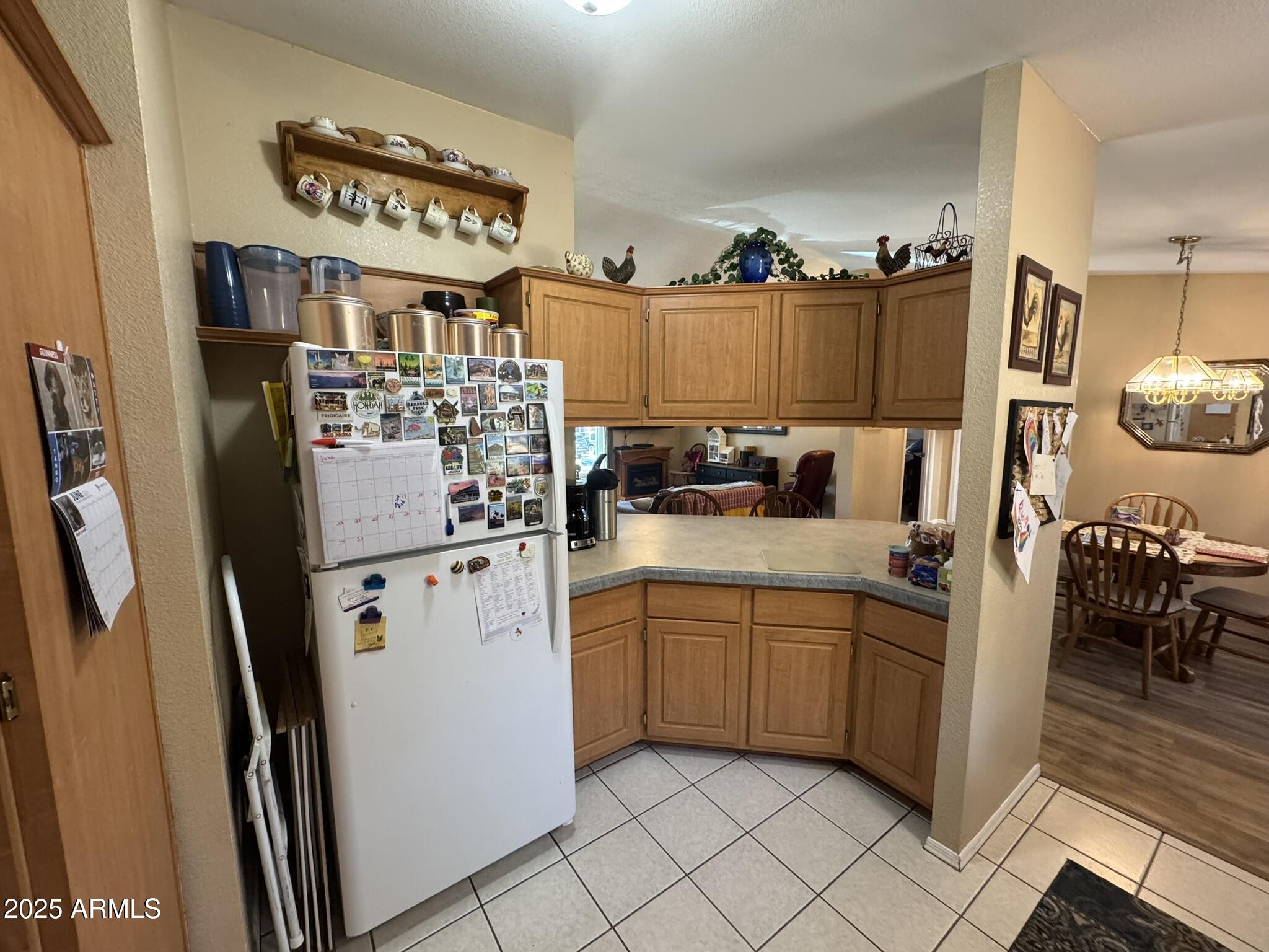 1998 Stagg Run Overgaard, AZ 85933 - Photo 57 of 61 a kitchen with stainless steel appliances a refrigerator and cabinets