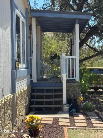 a view of a backyard of the house