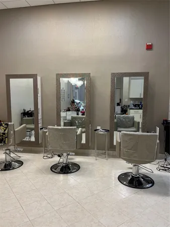 a room with a table and chairs