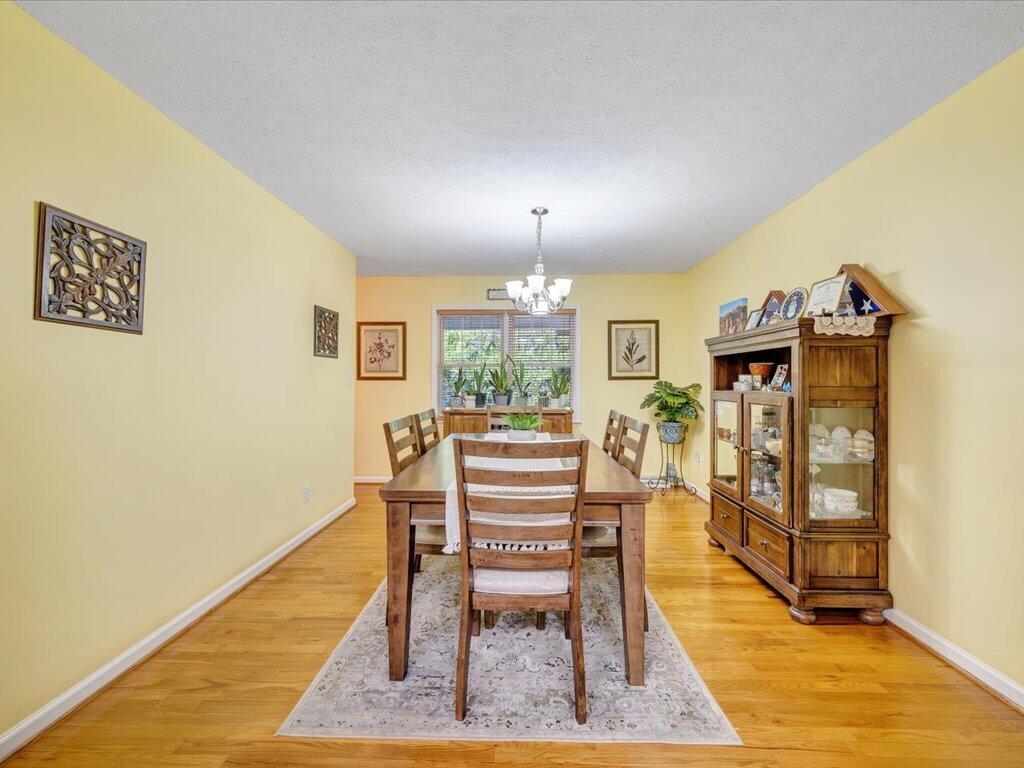3475 Blue Knob Road Martinsville, VA 24112 - Photo 13 of 80 a view of a livingroom with furniture window and wooden floor