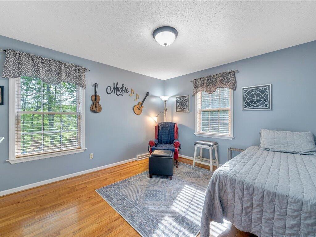 3475 Blue Knob Road Martinsville, VA 24112 - Photo 21 of 80 a bedroom with a bed and a window