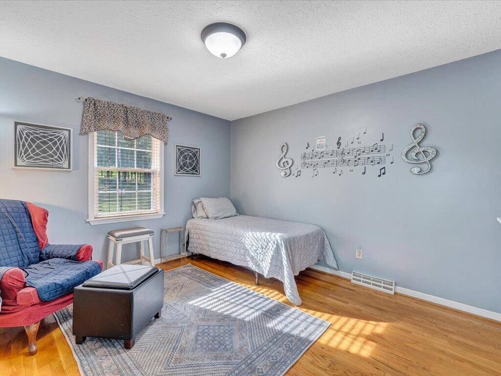 3475 Blue Knob Road Martinsville, VA 24112 - Photo 22 of 80 a bedroom with furniture and a window